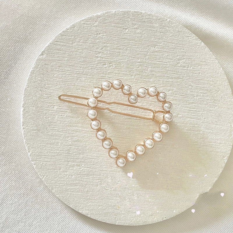 Ladies Full Heart Pearl Bow Cutout Hair Clip
