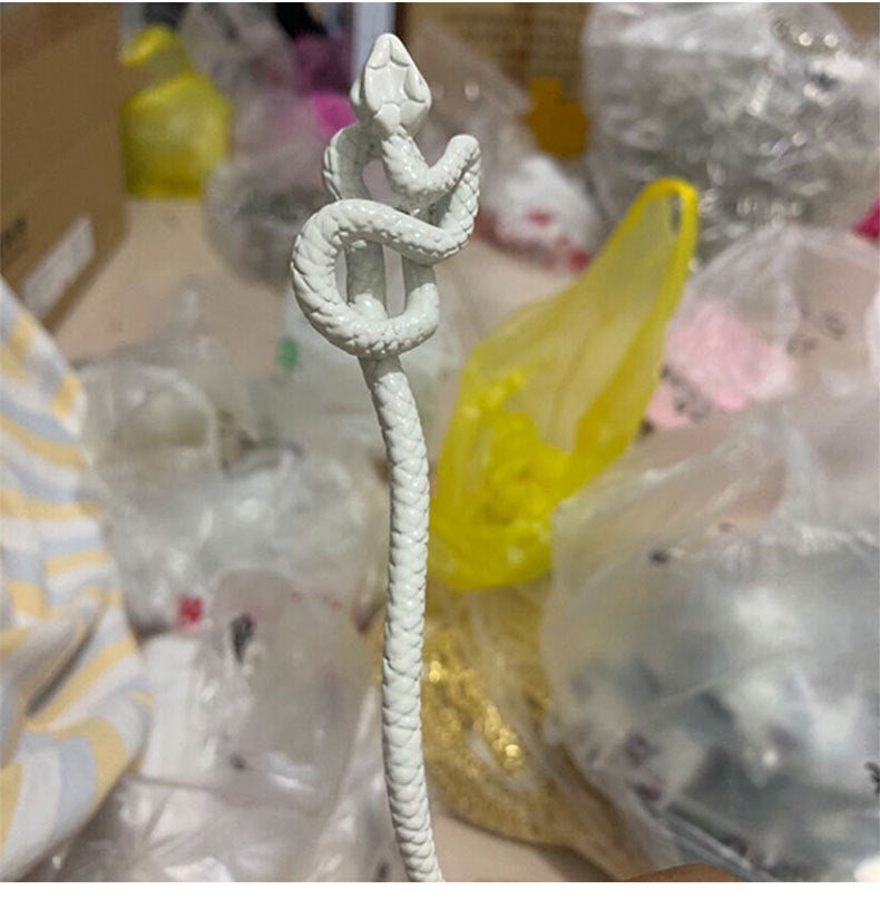 Retro Style Hairpin With A Single Character On The Back Of The Head