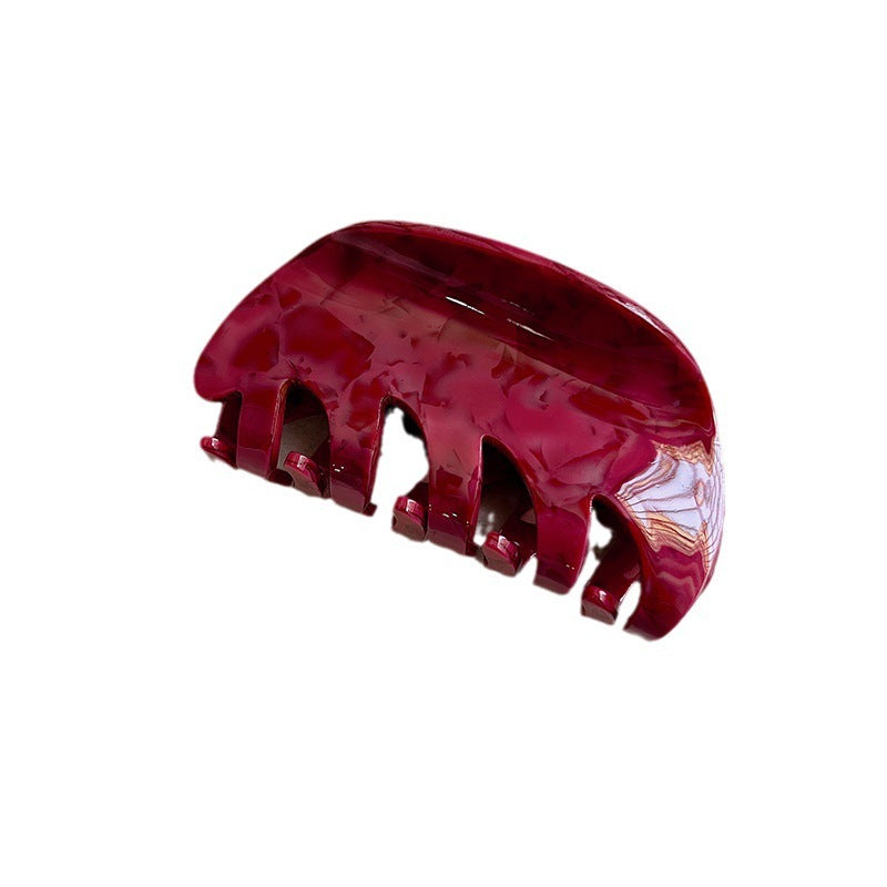 White Dragon Fruit Colored Hair Clip With A Spoon On The Back Of The Head