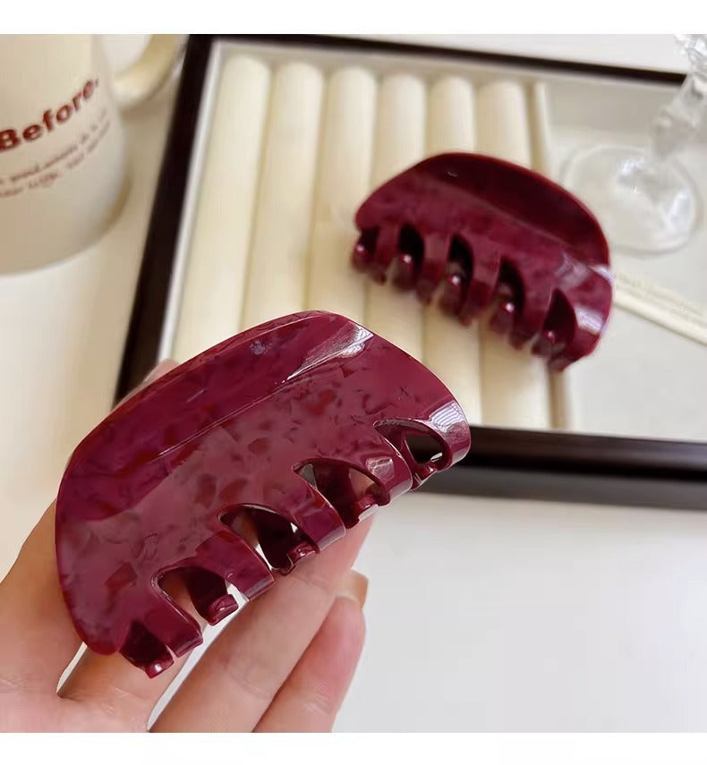 White Dragon Fruit Colored Hair Clip With A Spoon On The Back Of The Head