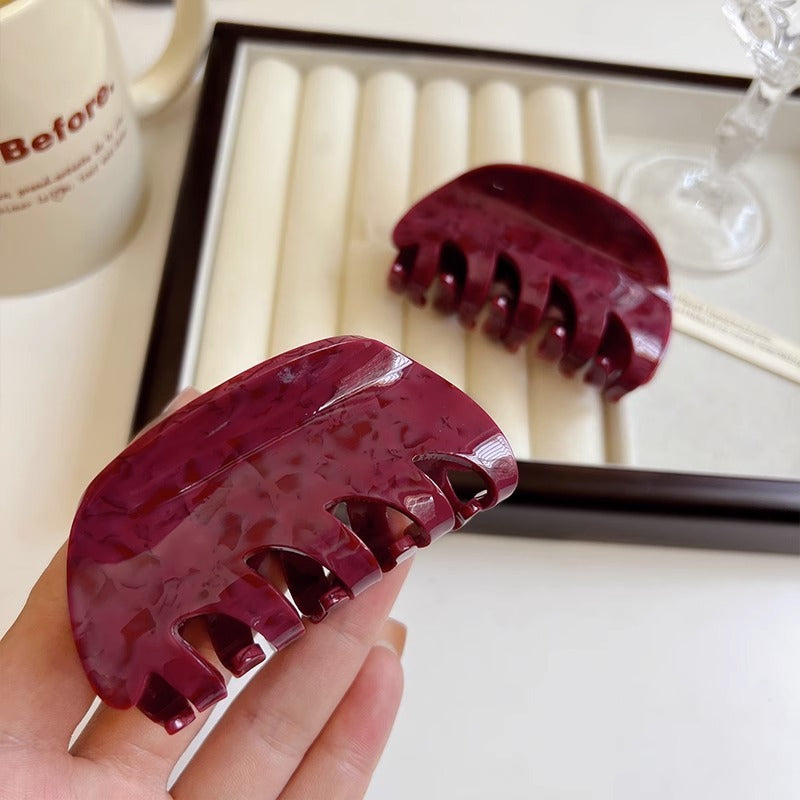 White Dragon Fruit Colored Hair Clip With A Spoon On The Back Of The Head